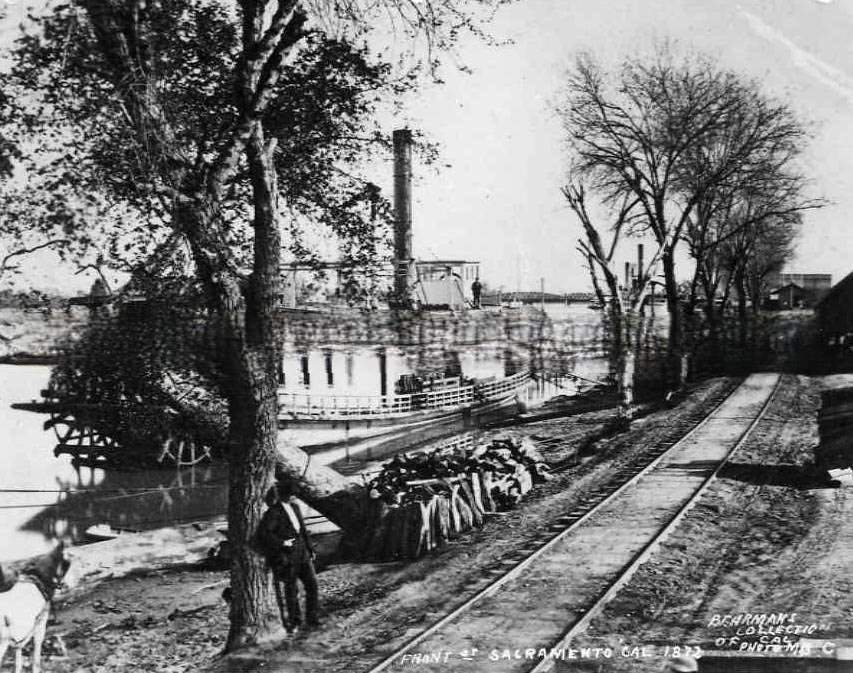 Sacramento wharf, stemboat docked, 1870