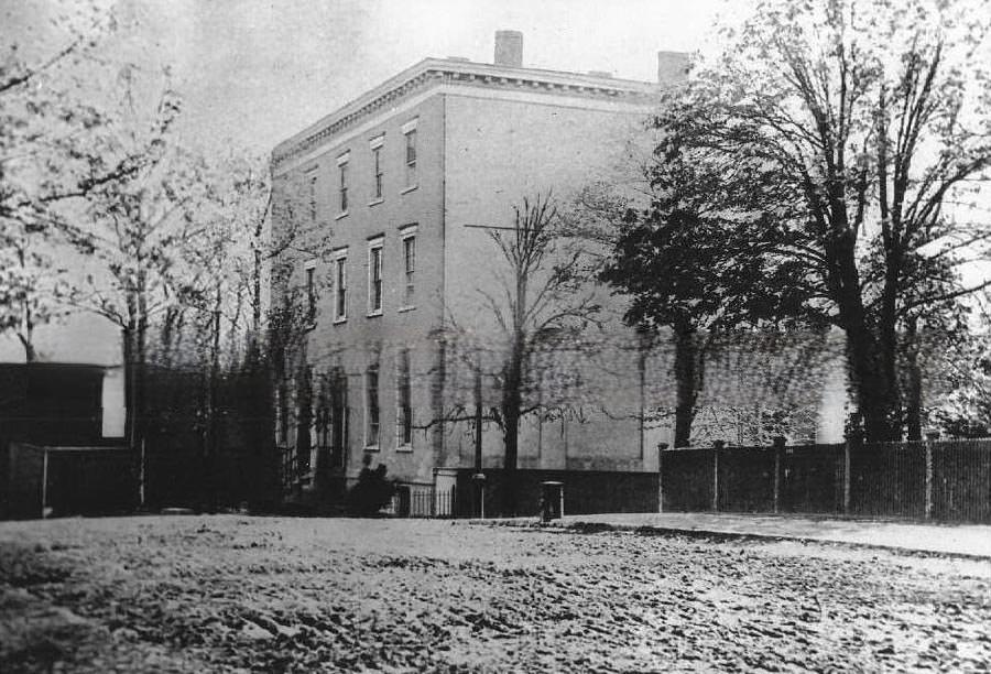 Exterior view of the state capitol during its construction, 1870