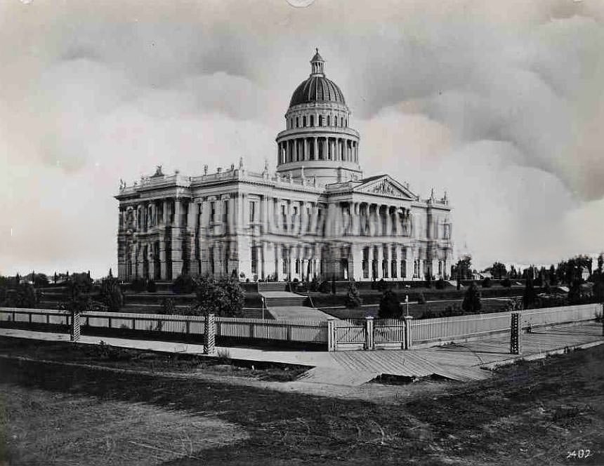 Exterior view of the first machine shop of the Central Pacific Railroad Company, 1876