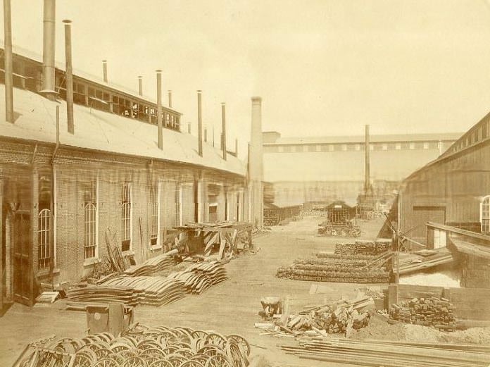 View of the original Central Pacific Railroad Hospital and grounds with carriage in circular drive, 1875