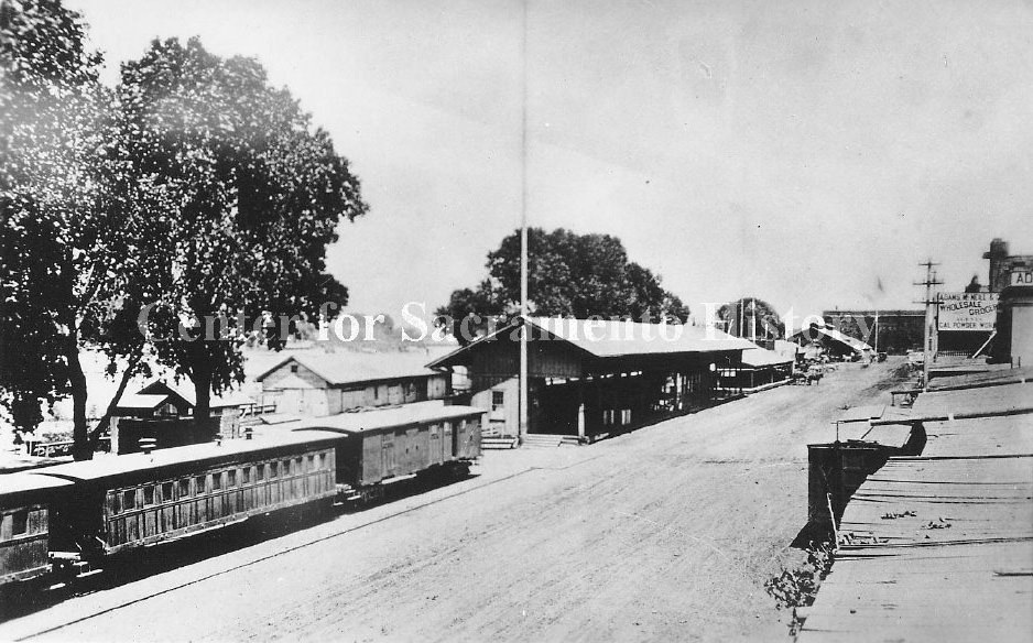 Elevated view of Sacramento from the California state capitol during its construction looking northwest out across the city, 1870