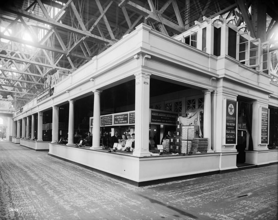 The Roberts, Johnson & Rand employees work the shoe factory in the Manufactures palace at the Louisiana Purchase Exposition, 1904.