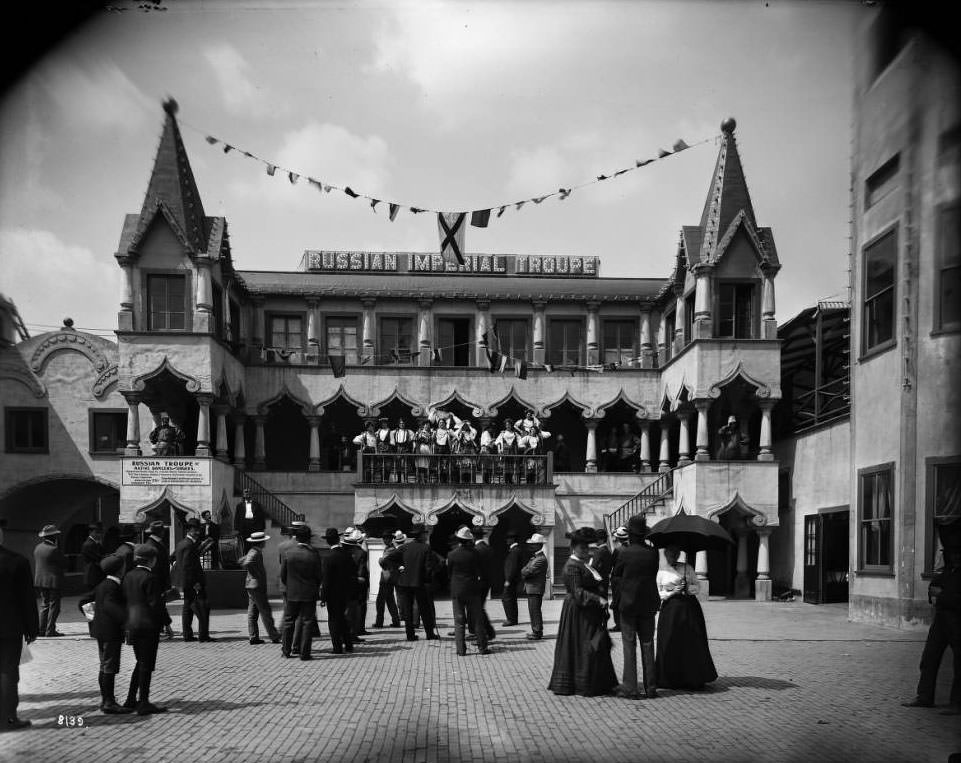 Members of the Imperial Russian Dance Troupe in native dress catch the interest of fairgoers at the Louisiana Purchase Exposition, 1904