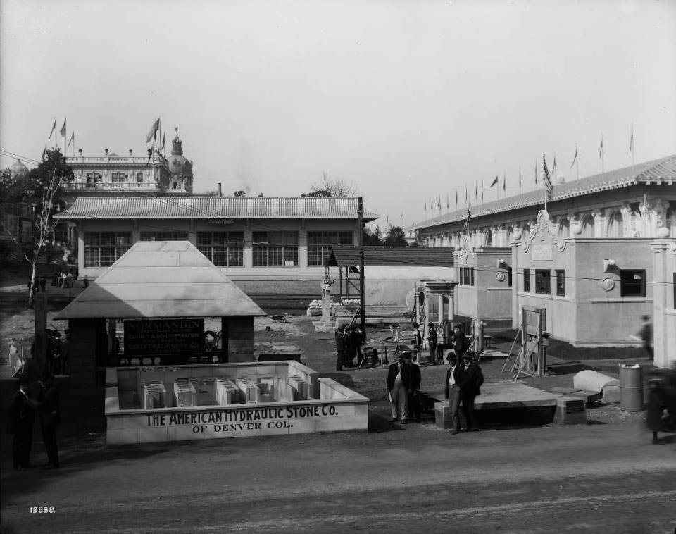 The American Hydraulic Stone Company, Denver, Colorado, exhibited machinery used for making hollow concrete walls and partitions in an outdoor space east of the Palace of Liberal Arts at the Louisiana Purchase Exposition