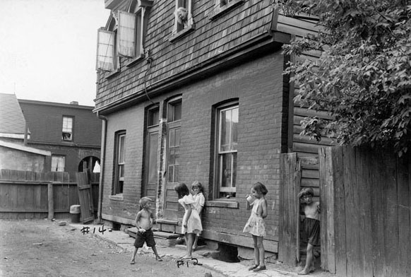 Kids playing on Gerrard, 1940s