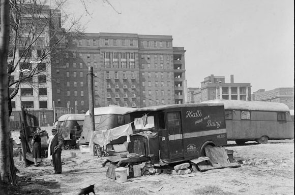 Collection of trailers being used as homes near Centre and Gerrard streets, 1940s