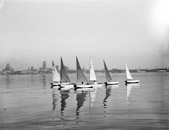 Sailboats on a tranquil Toronto bay, 1940s