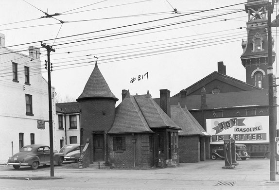 A Joy Oil gas station earmarked for demolition at Dundas and Parliament prior to construction of Regent Park, 1940s