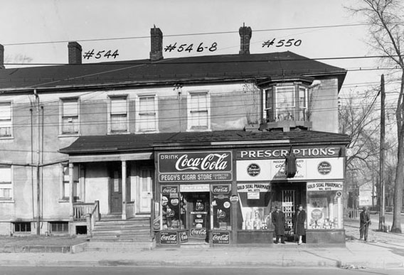 Peggy's Cigar Store and Gold Seal Pharmacy on Dundas St. E. in Regent Park, 1940s