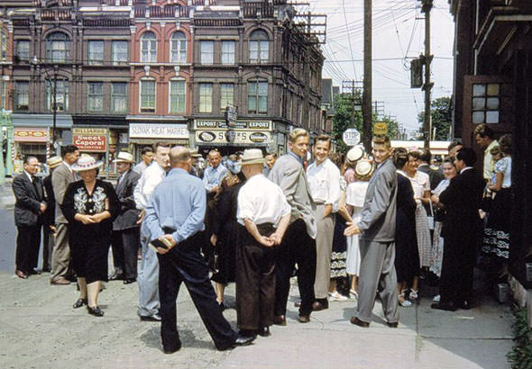 People getting out from Sunday service, 1950s