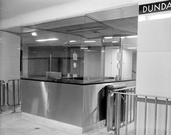A collection booth at Dundas Station, 1950s