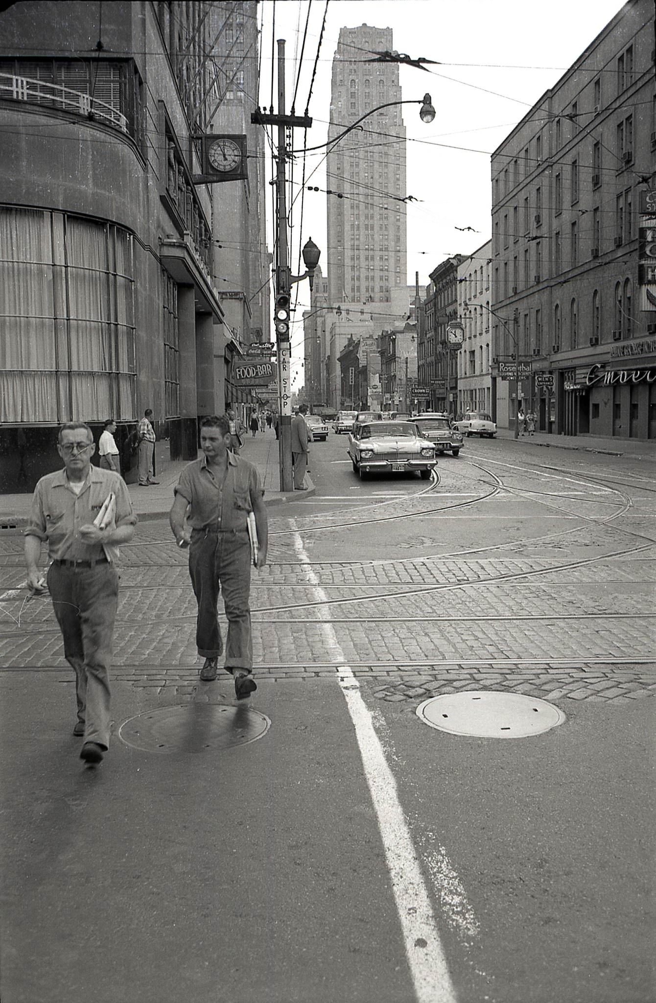 View looking east on King St. W. at York St., 1960s.