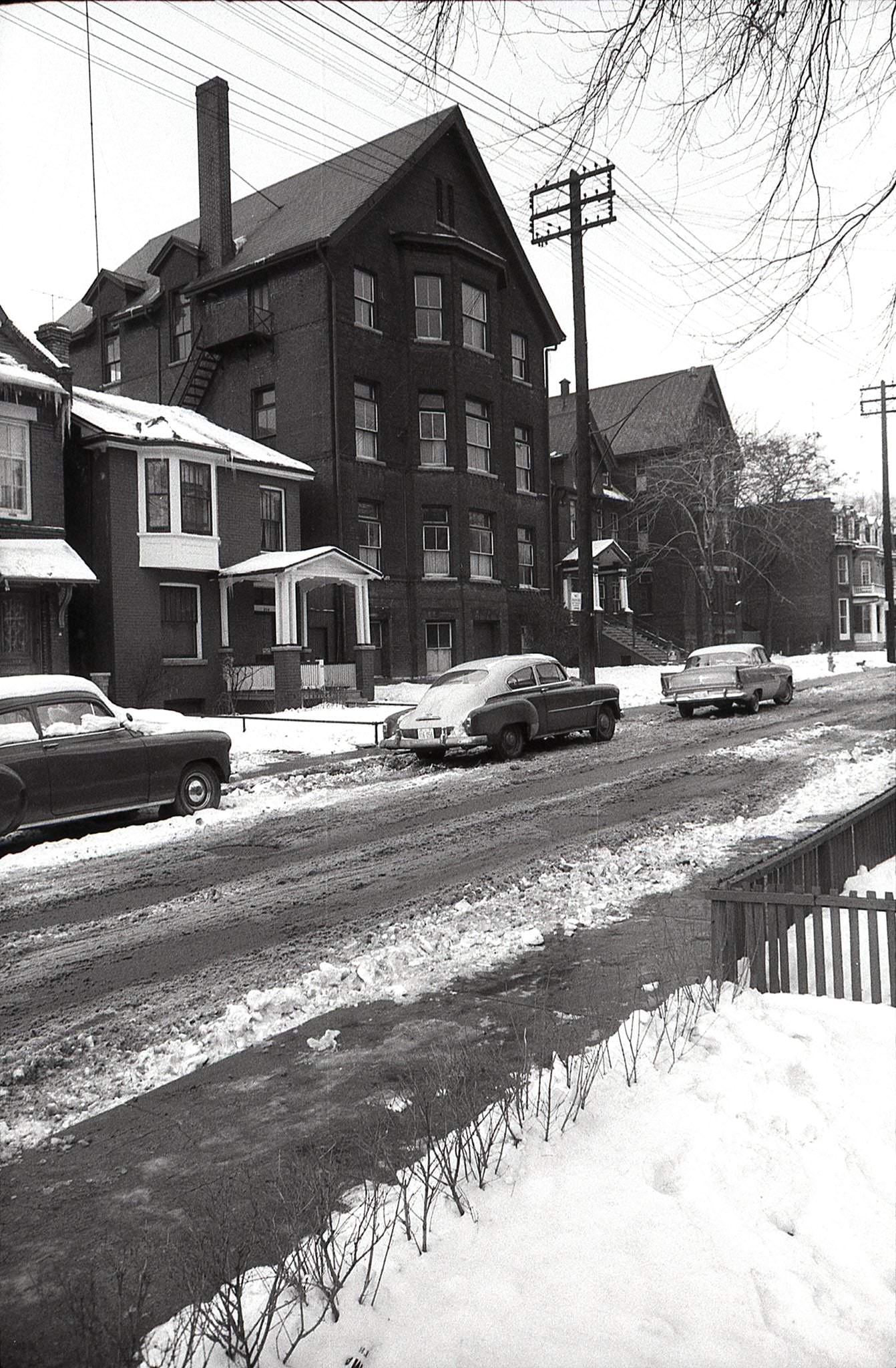 West side of Seaton Street, north of Gerrard, 1958.