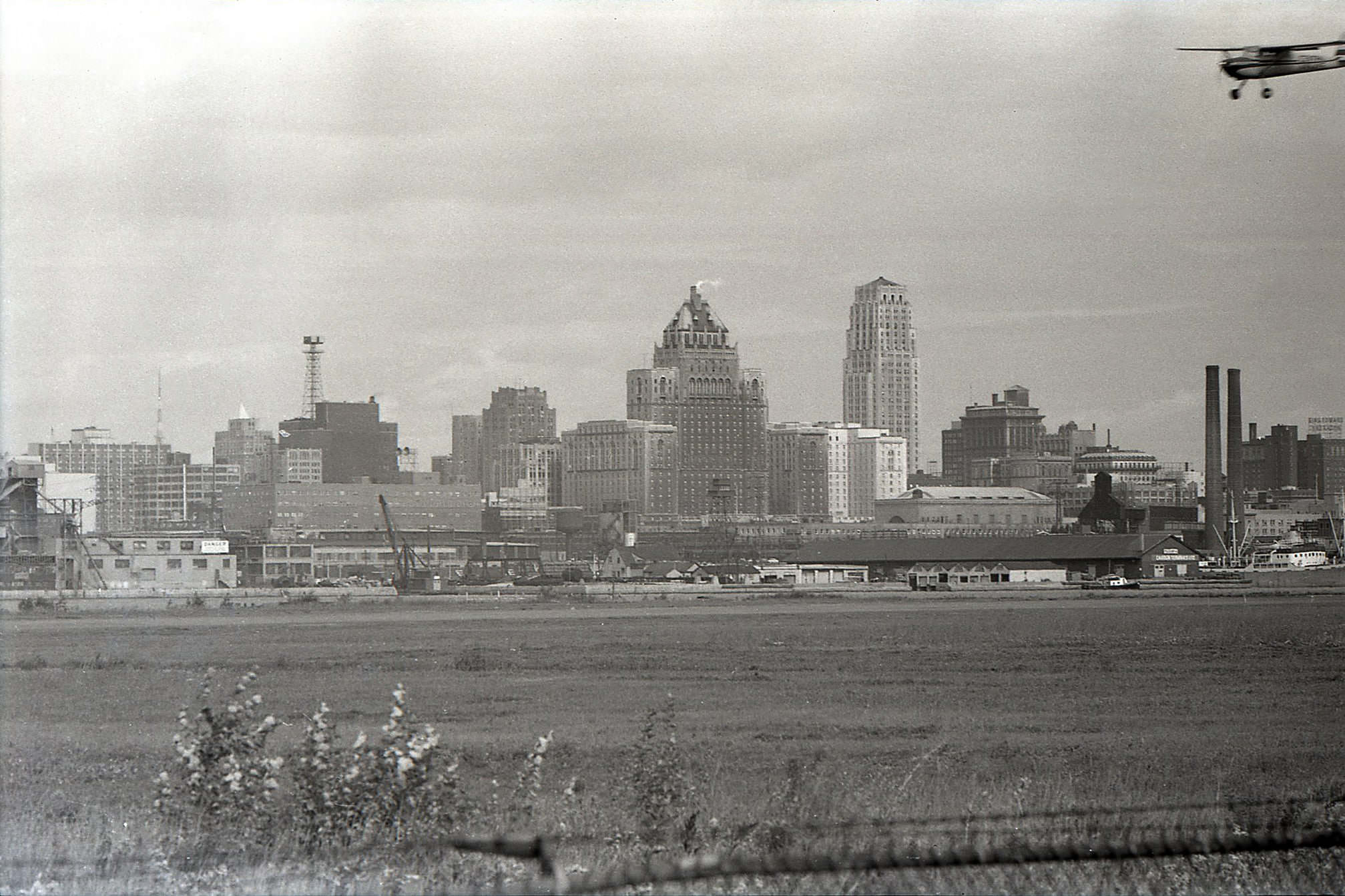 A view looking north east to the downtown Toronto skyline, pre-modern office towers, 1959