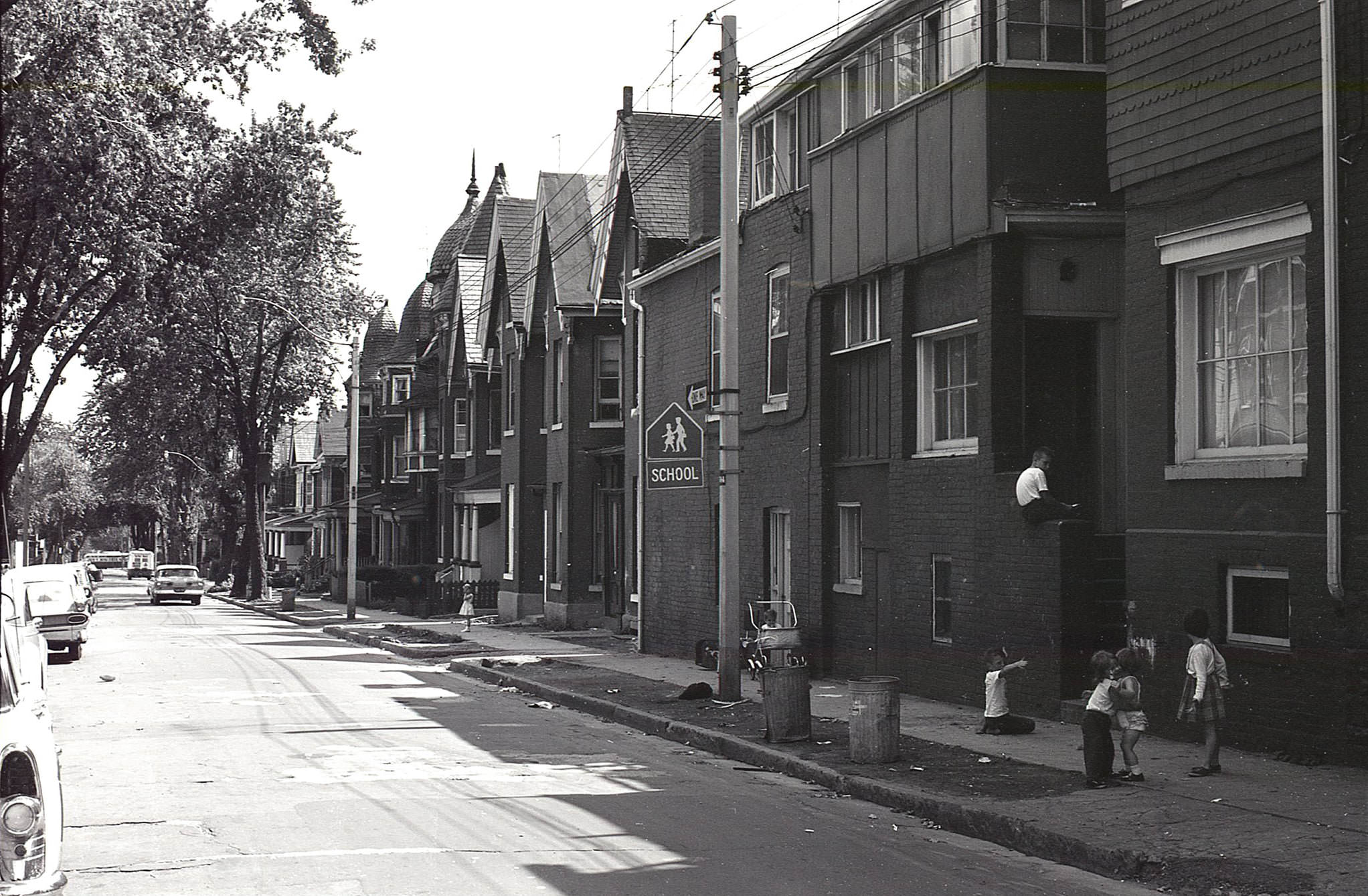 A view looking south on Ontario St. from Wellesley St., 1963. Practically none of these houses exist today.