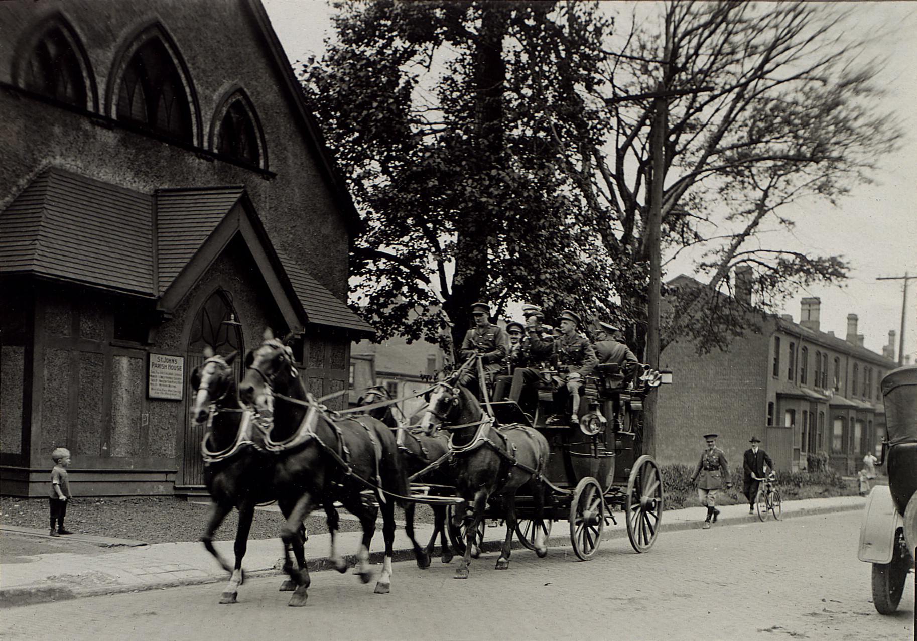 Going to Major Moss' wedding at the Garrison Church, 1919. Location is Stewart Street west of Portland, south side, looking west.