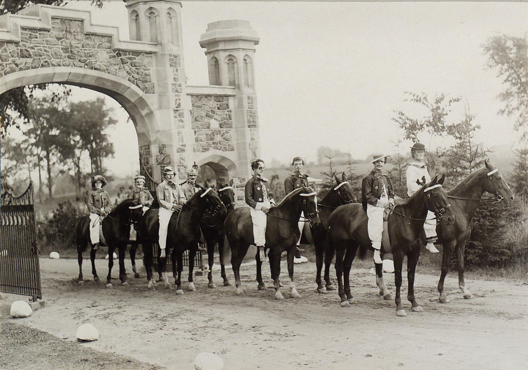 Procession of clowns at the gates of Sir Henry Pellalt's, 1922.