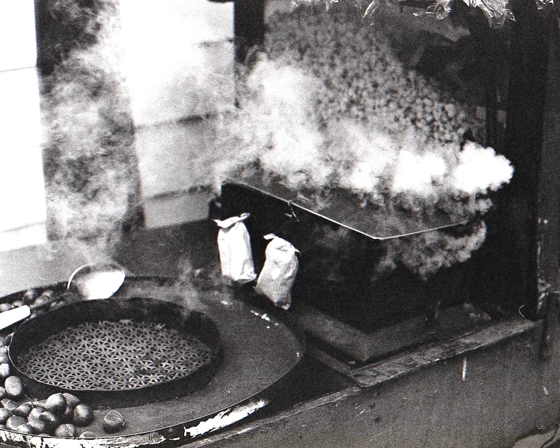 Chestnuts roasting on an open fire... Yonge St. Vendor, mid-1970s.