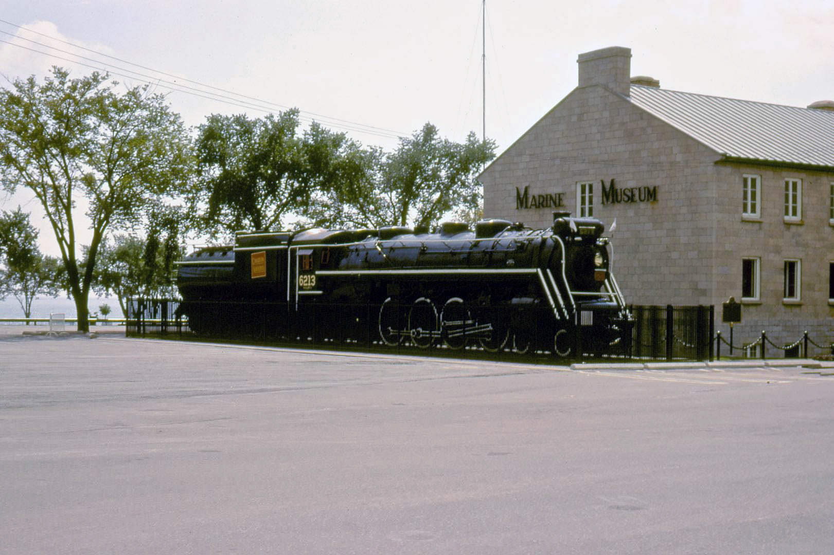 Canadian National Railways #6213 steam locomotive beside the Toronto Marine Museum, CNE grounds, 1968