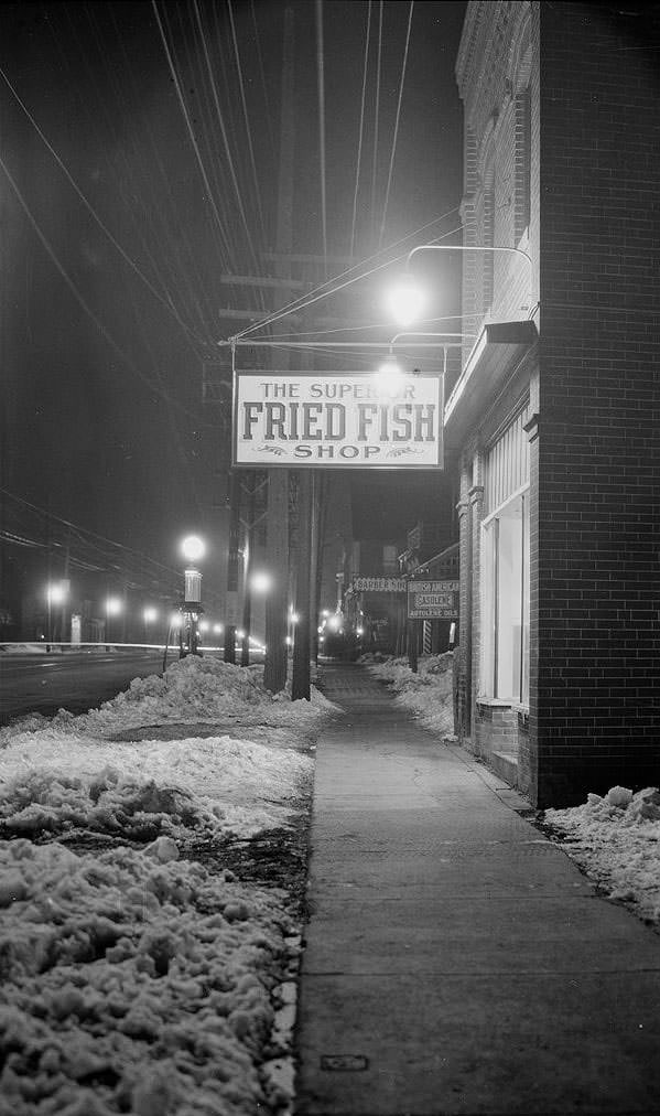 Night view looking north to The Superior Fried Fish Shop, 1887 Yonge Street, Mar. 9, 1923.