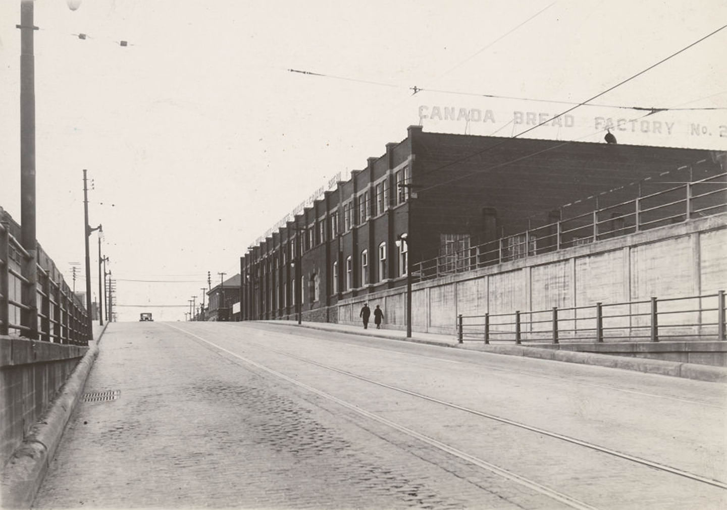 View looking west on Bloor St. W., to Dundas St. W., Canada Bread Company's Factory No. 2 stands prominently here, 1929