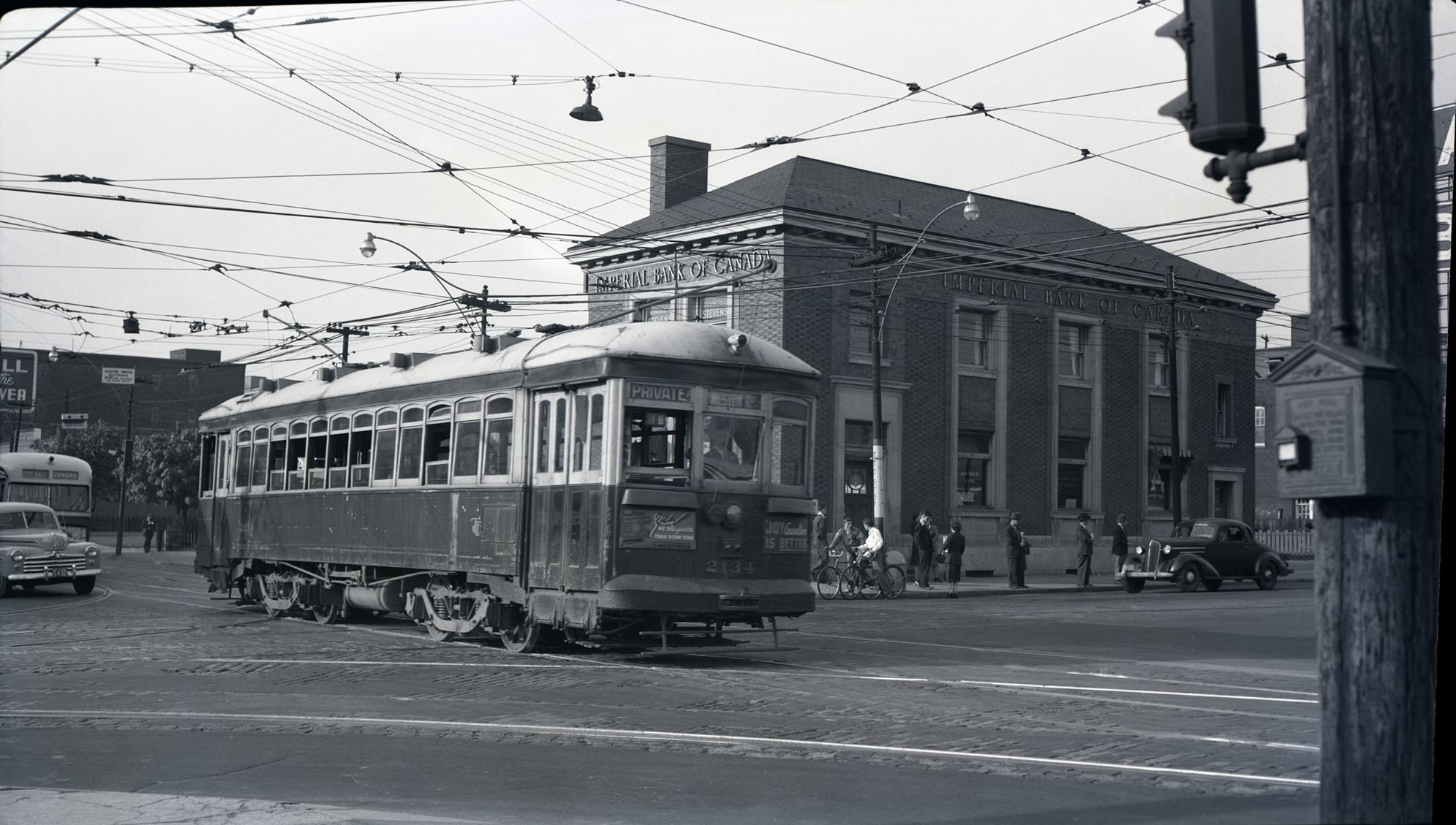 TTC Streetcar 2134 heading south on Dundas St. W. at Bloor Street, 1948.
