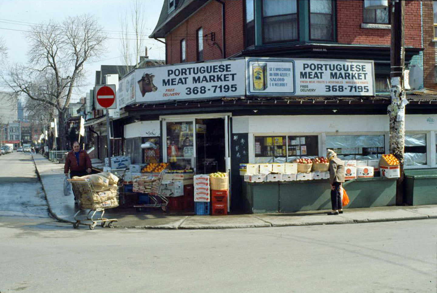 Portuguese Meat Market, looking east on Augusta Ave. at Oxford St., 1980s