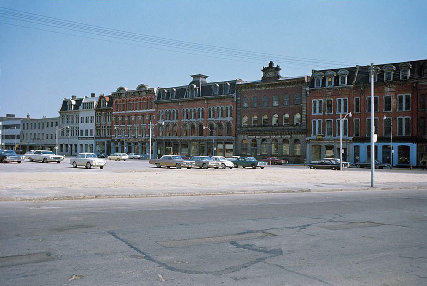 View looking southeast to Front St. E. from Scott St., Aug. 1966.