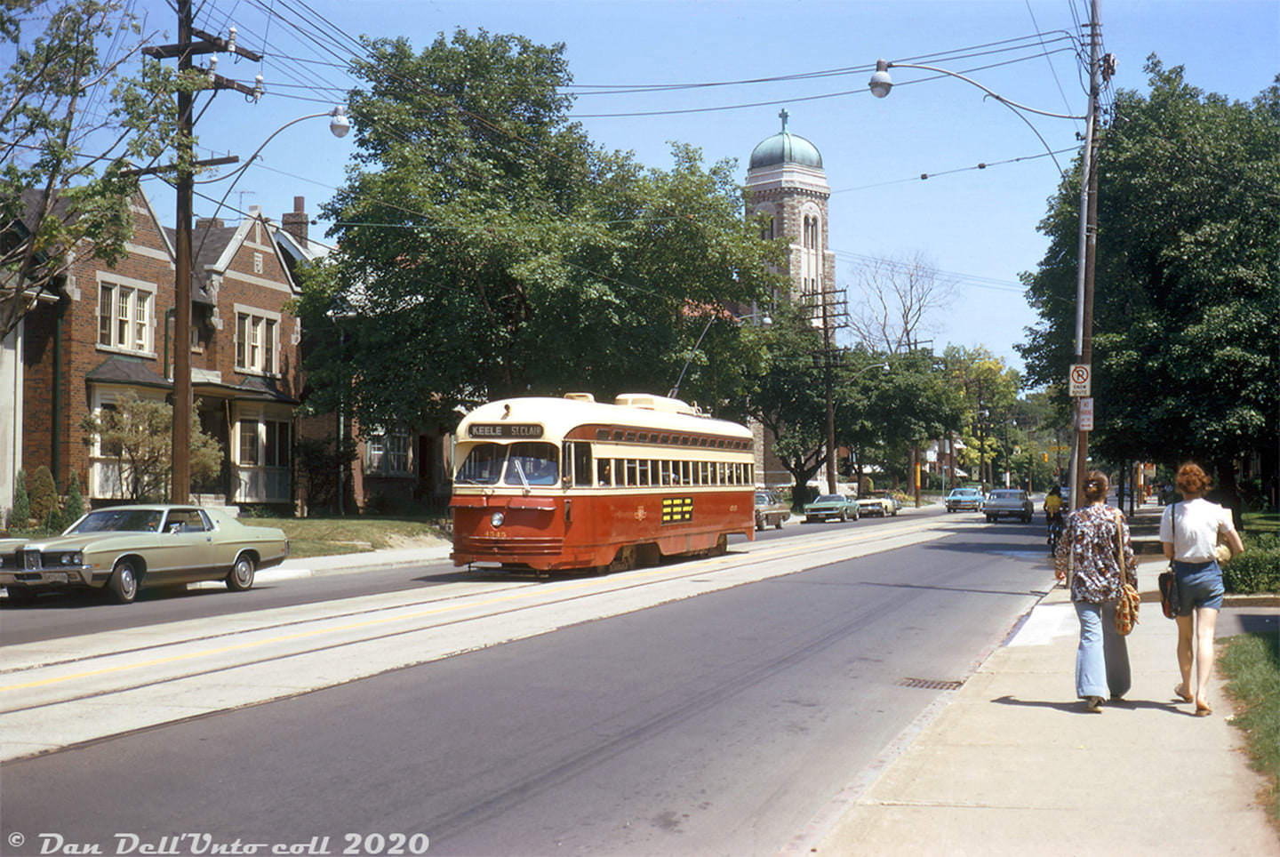 TTC PCC streetcar 4545 heads westbound on St. Clair Ave. East near Our Lady of Perpetual Help Catholic Church on a sunny Summer afternoon in 1972, after coming down Mount Pleasant Ave. from Eglinton loop at the end of the St. Clair route.