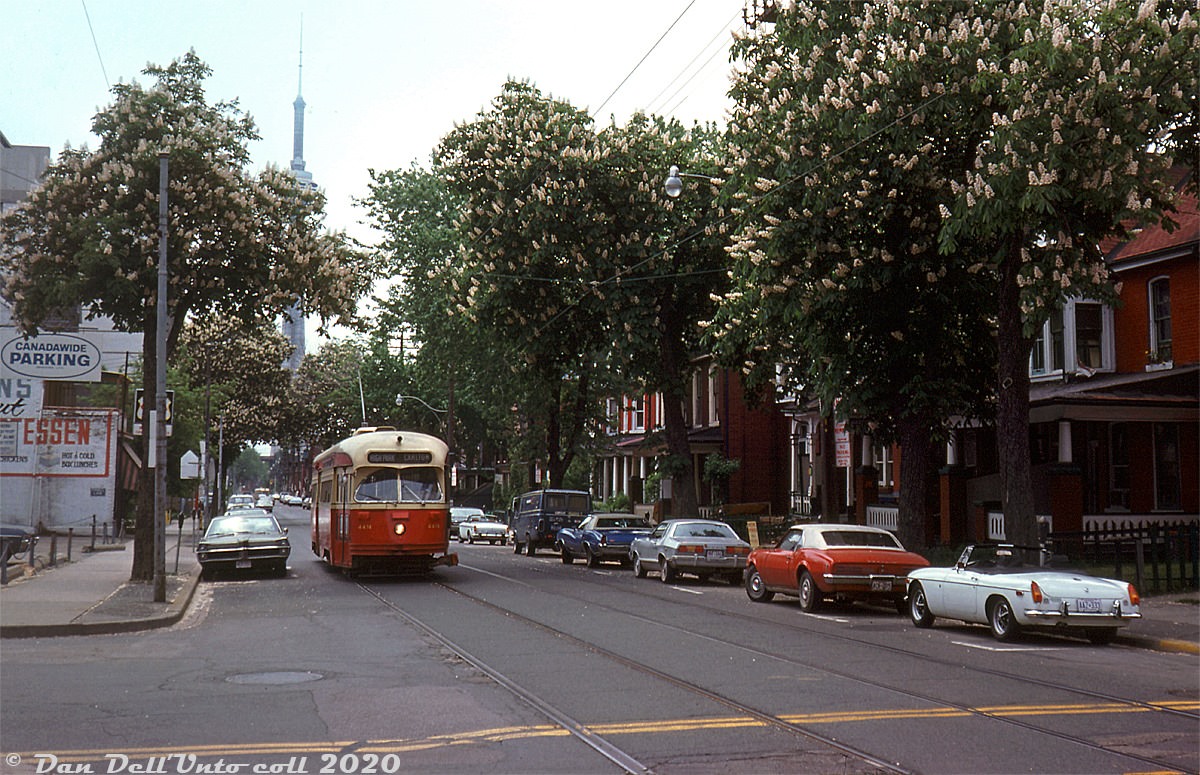 A TTC PCC streetcar on the Carlton route (possibly on diversion or detour) heads north on McCaul Street between Dundas and College, 1975