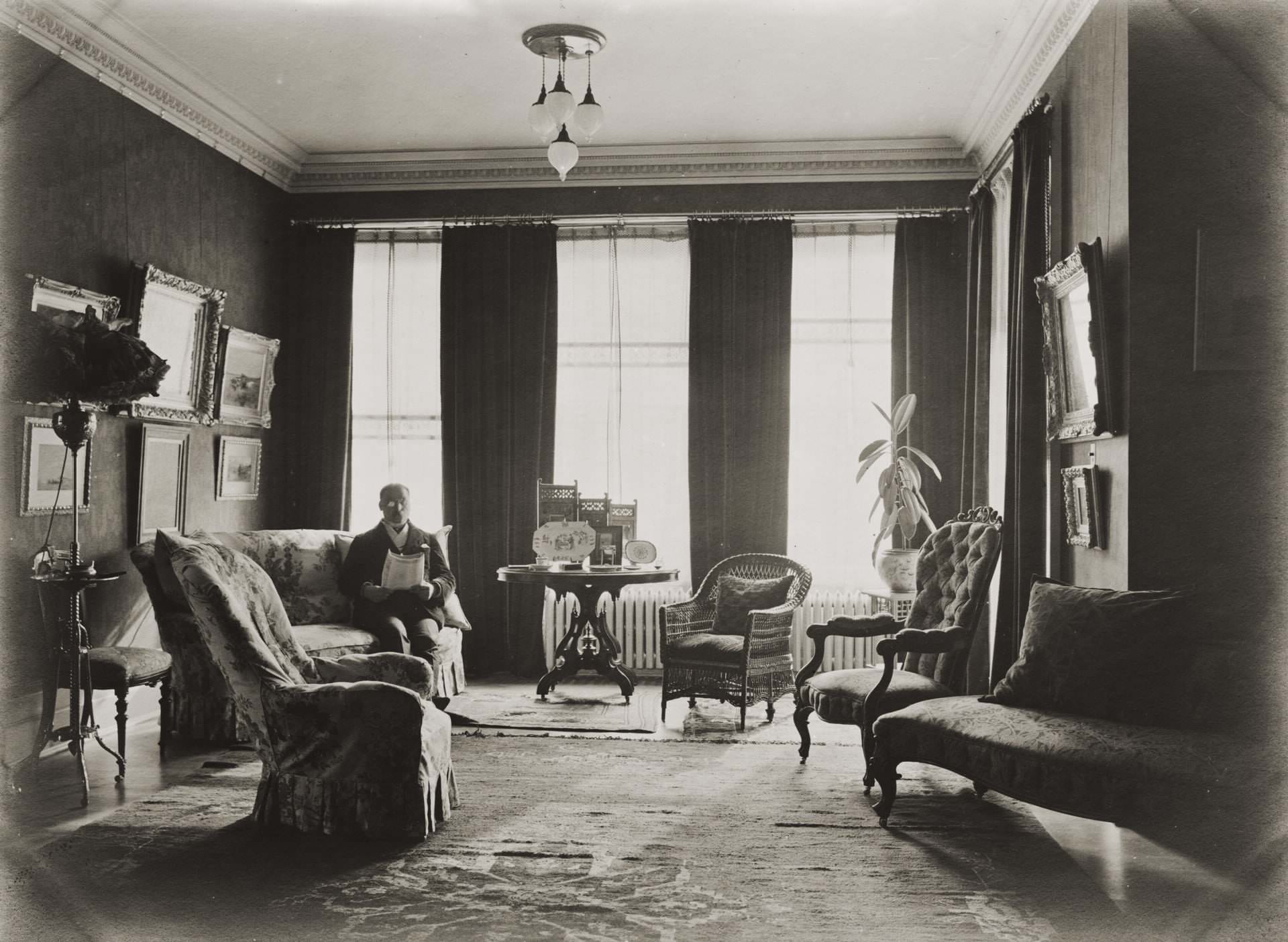 Mr. Daniel Wilkie, in the drawing room of the Wilkie, Daniel R., house, 432 Sherbourne St., w. side, between Carlton & Wellesley Sts., 1908.
