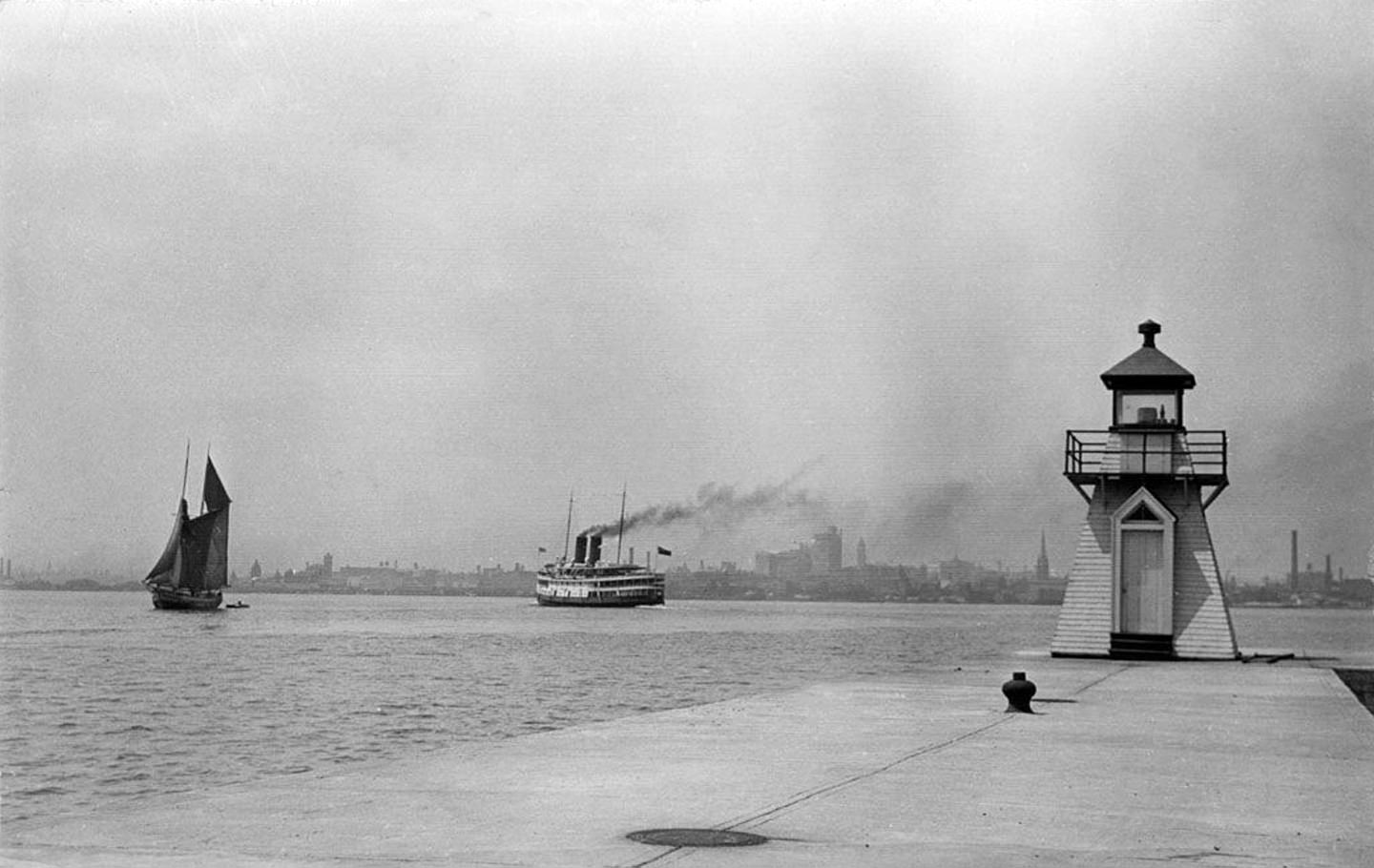 Steamship Cayuga and a schooner (left) in Toronto Bay from the eastern gap, some time after 1907.