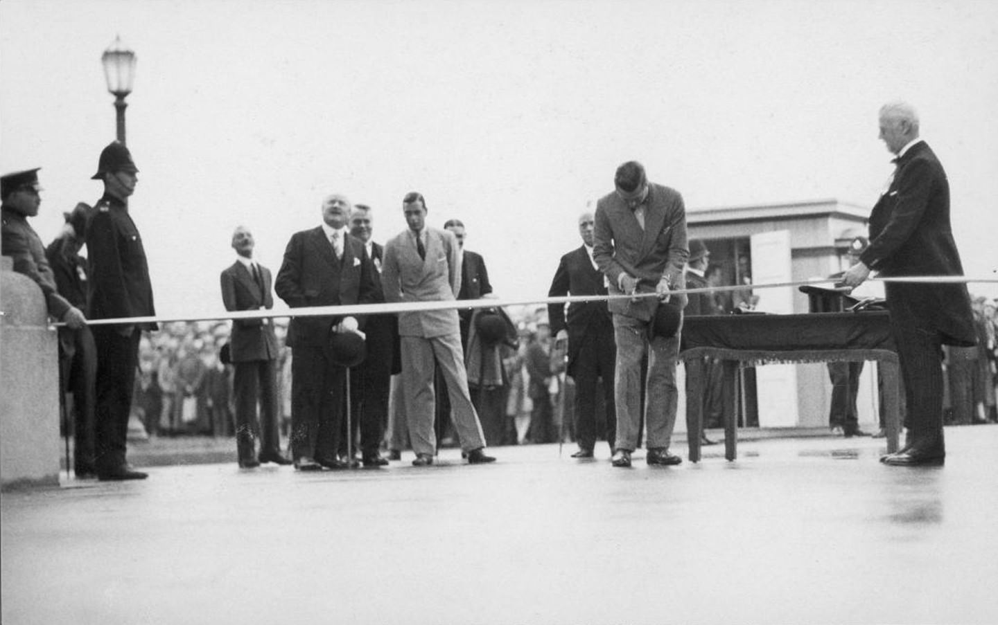 Cutting the ribbon at the formal opening ceremony for the CNE's Princes' Gates, Aug. 30, 1927.