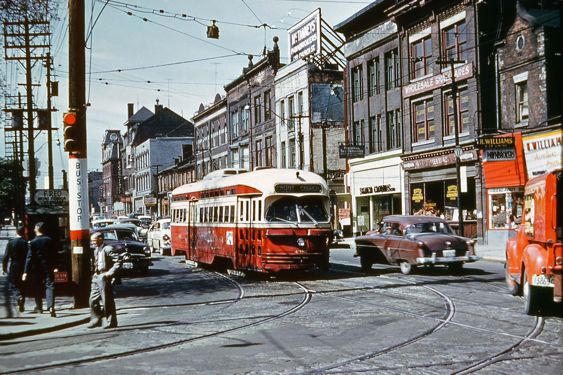Looking northeast at the intersection of Church and Queen Streets, 1954