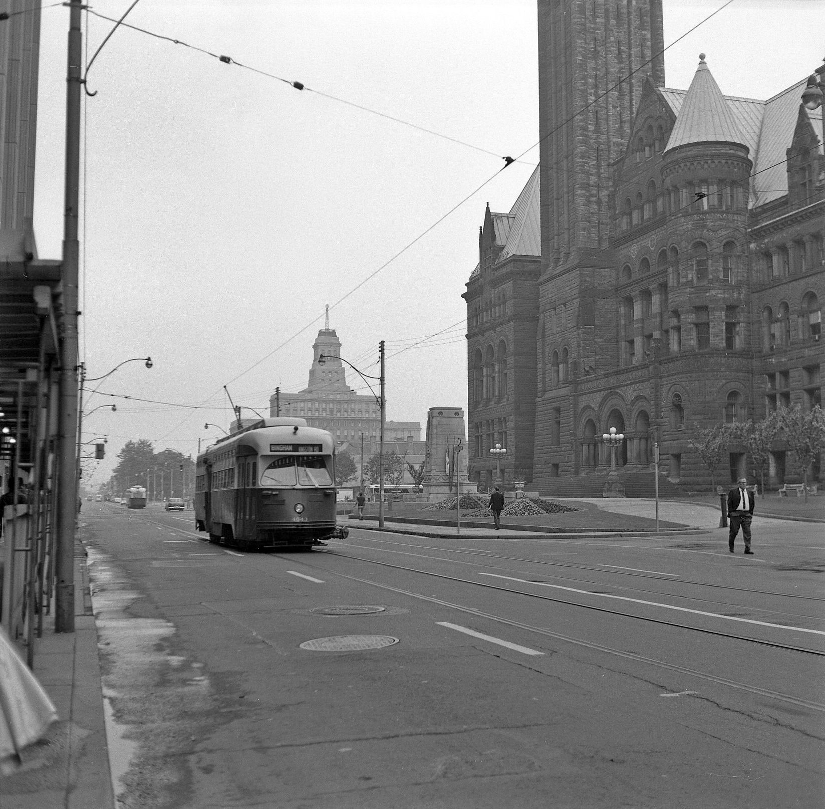 TTC Streetcar 4643 Kingston Road line heading eastbound on Queen Street West at Bay Street. 5 July 1968.