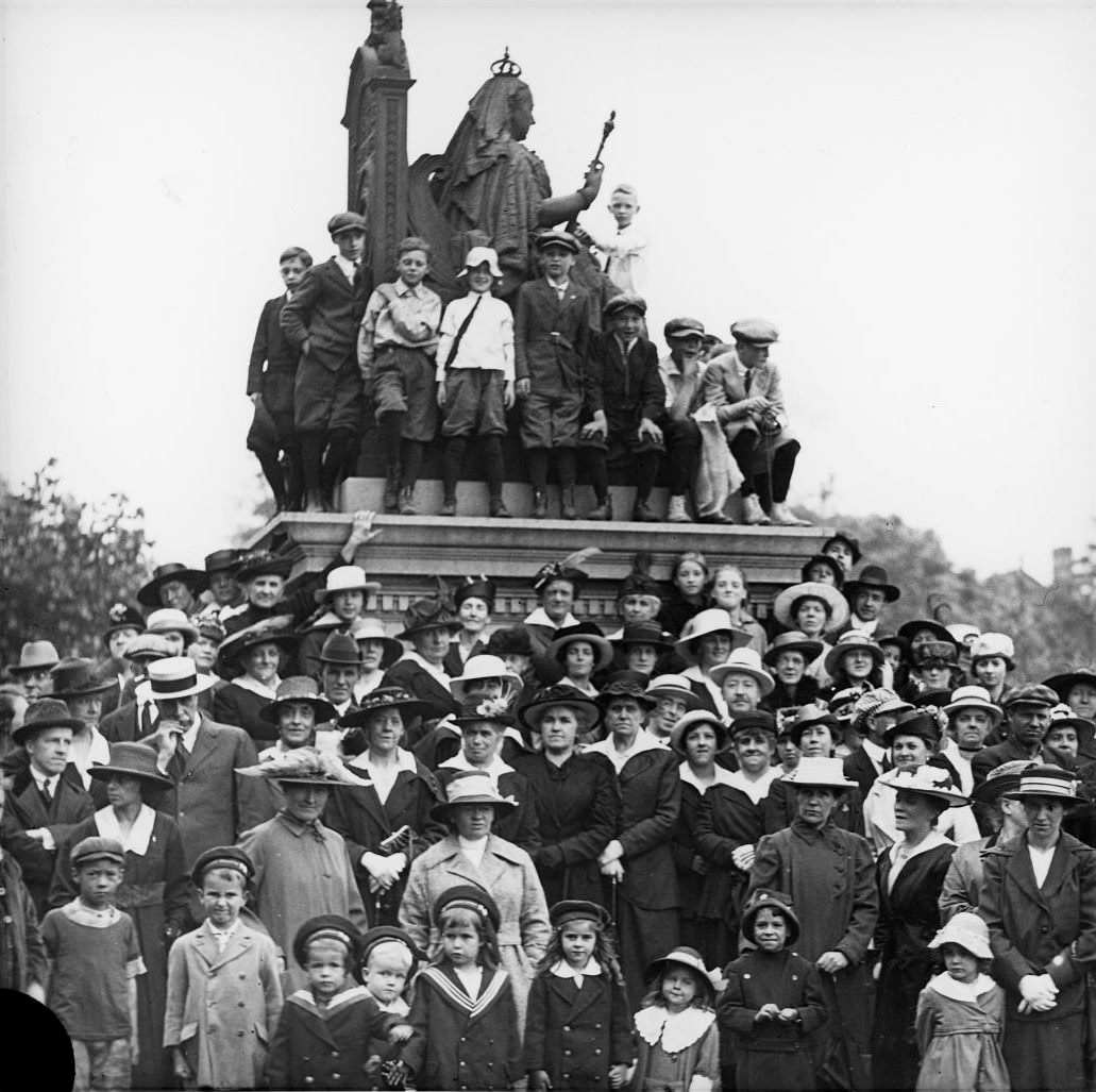 Happy Victoria Day! Group at statue of Queen Victoria, Queen's Park, 1912.