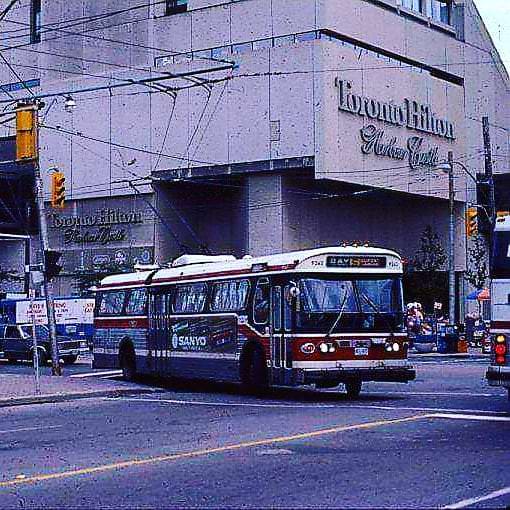 TTC Flyer Trolleybus passing the Harbor Castle Hilton September 8, 1985.