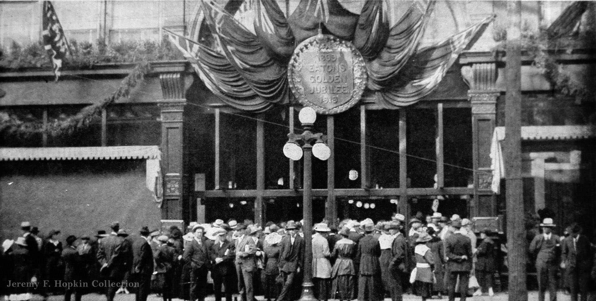 "Early bargain" crowds waiting for the Eaton department store doors to open, Labour Day 1919.