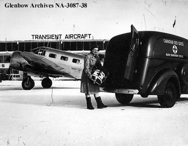 Canadian Red Cross worker at the Malton airport, 1950