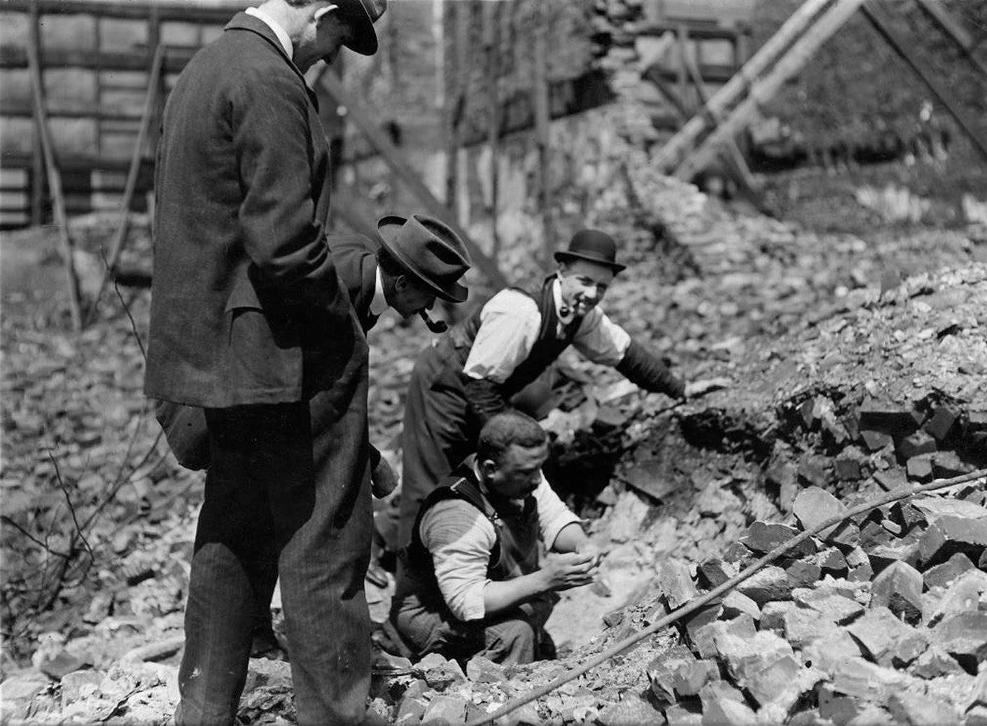 Curio seekers recovering items from ruins of the Great Fire of 1904.