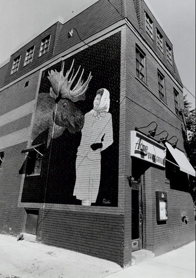 The mural that was on the wall of 86 John Street before it was painted over with this one of the Queen and a moose, 1990s
