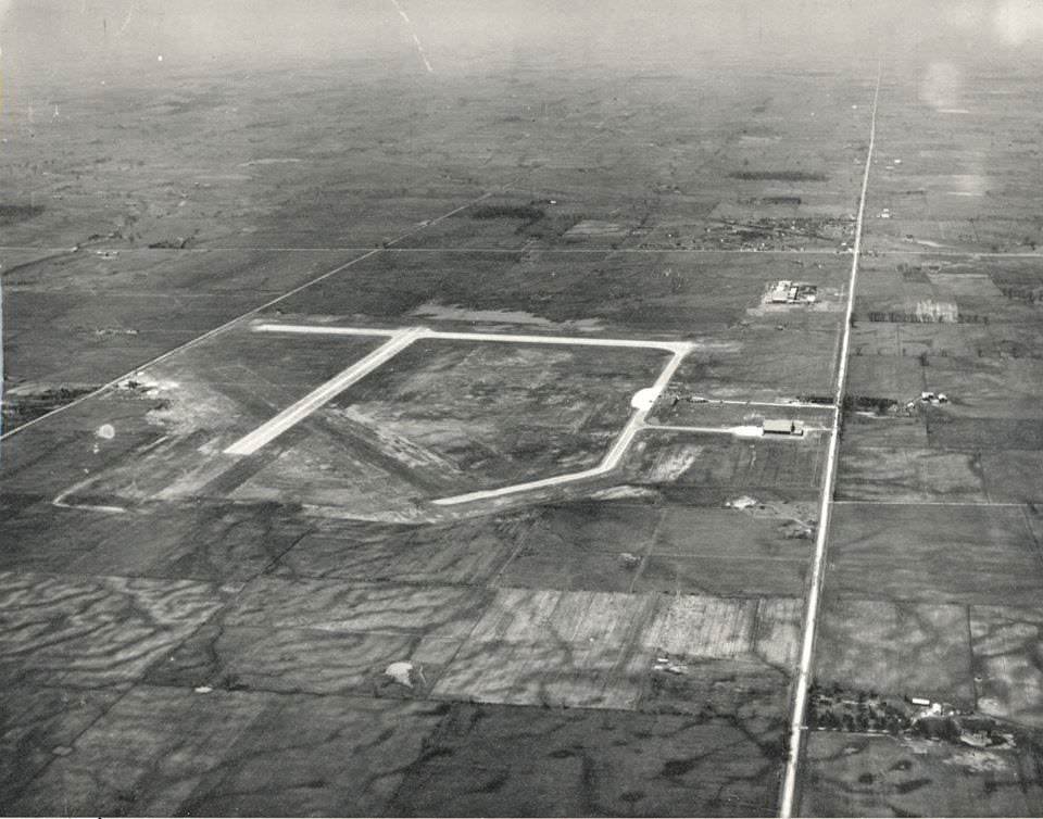 Malton(Pearson) Being built, as 1st finished with one grass runway, see the little National Steel Car plant, 1948