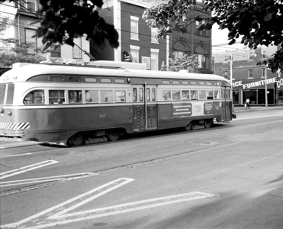 Streetcars along Queen West between Beverley and Peter Streets, 1982