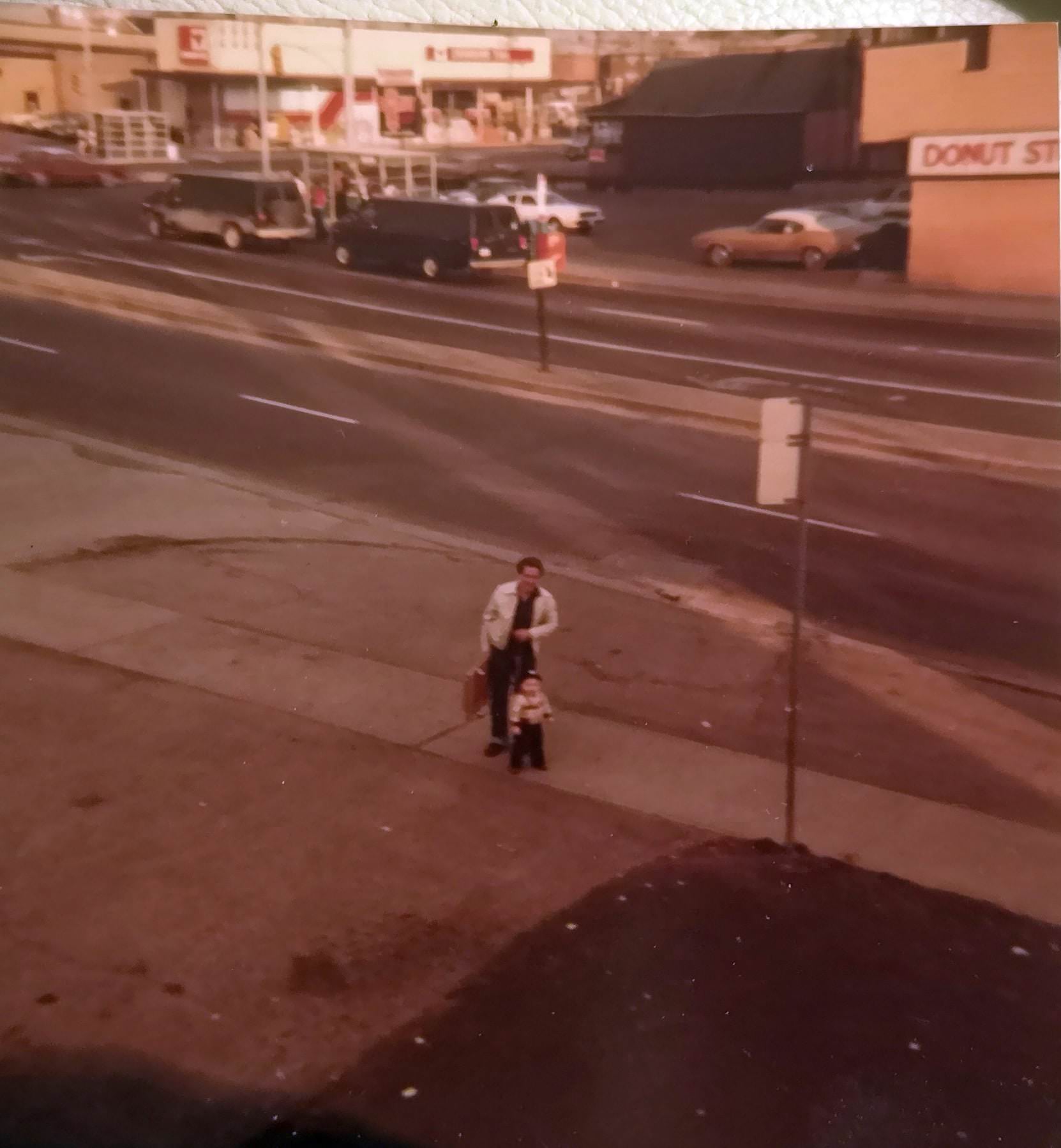 The corner of Jane & Lawrence with what appears to be a Canadian Tire store (now a transmission shop and a Salvation Army thrift store) and a Donut Stop, 1980s