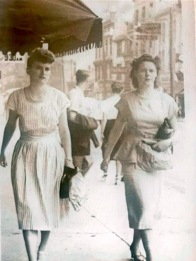 Ladies walking up Yonge Street, 1940s