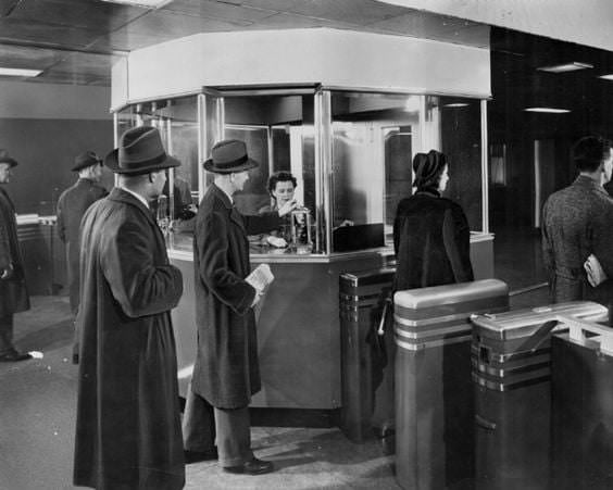 Mockup of TTC subway collectors booth, 1949. This booth was located on the upper floor of TTC Sherbourne st garage with a mockup subway station.