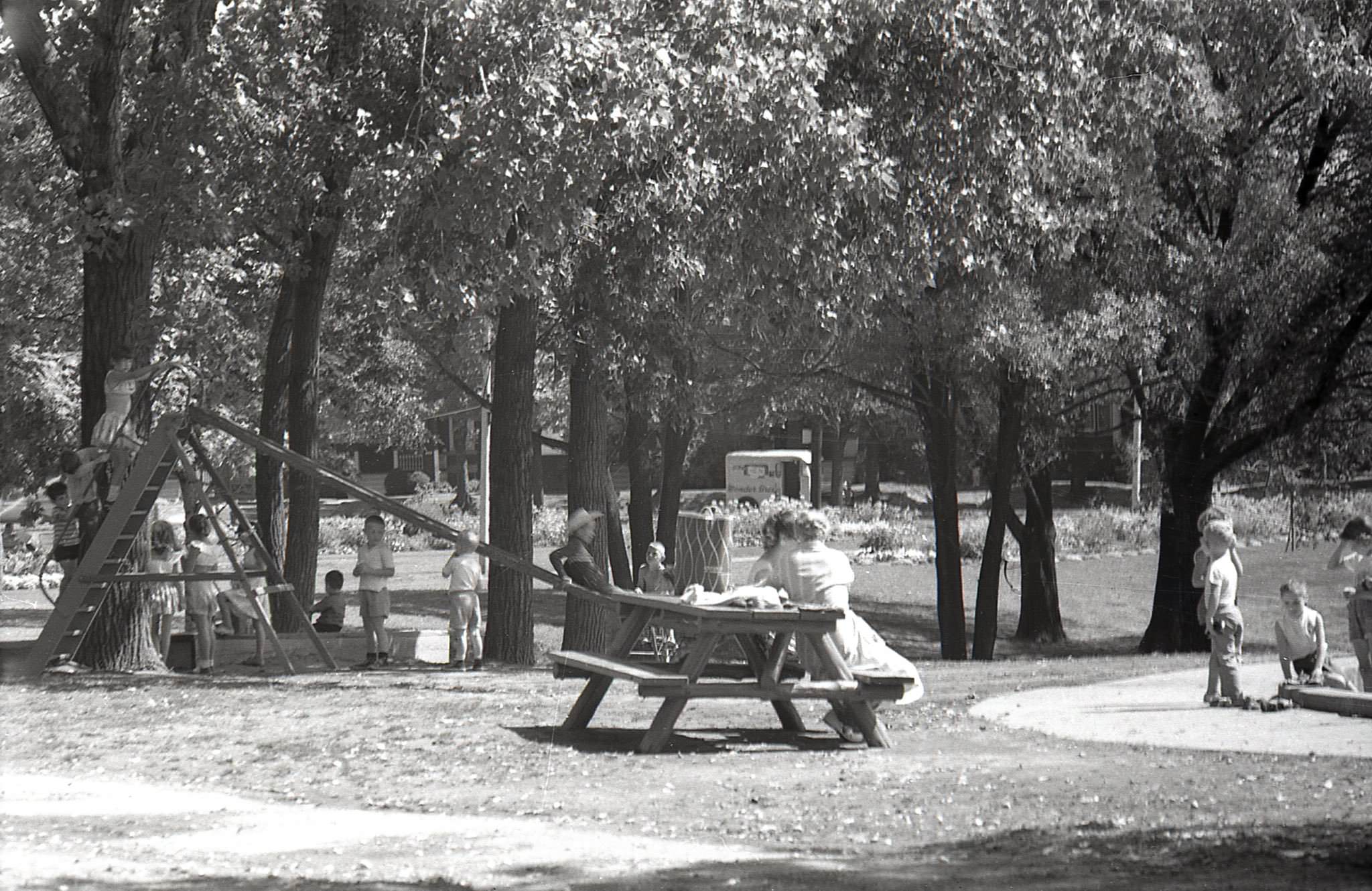 Withrow Park wading pool, looking northwest toward Logan Avenue, 1960s.
