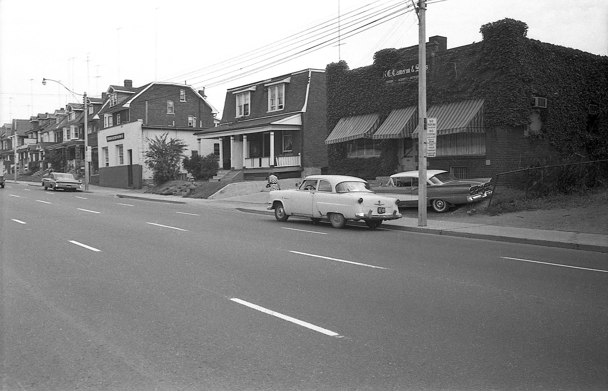N C Cameron & Sons, (Importers) 919 Dufferin St., 1960s. This is on the NE corner of Dufferin and Dufferin Park Ave. Now an apartment building. Houses to the north still stand.