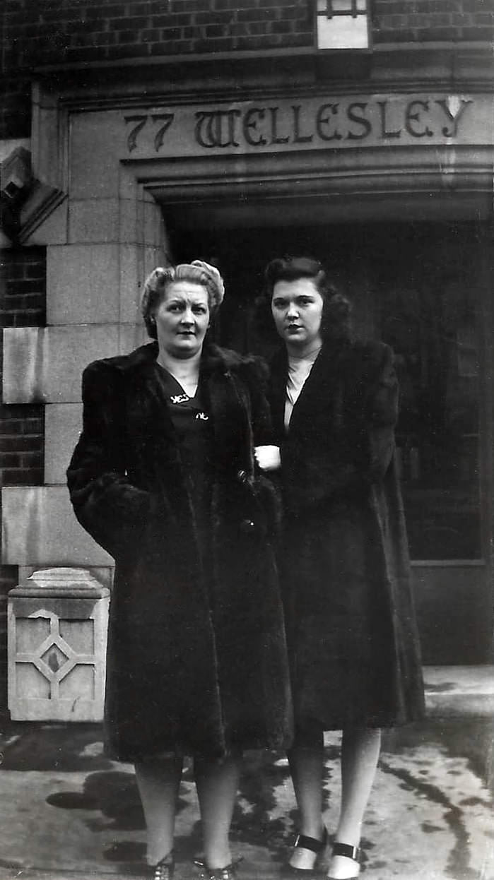 Two women at 77 Wellesley St. E., near Church St., 1945