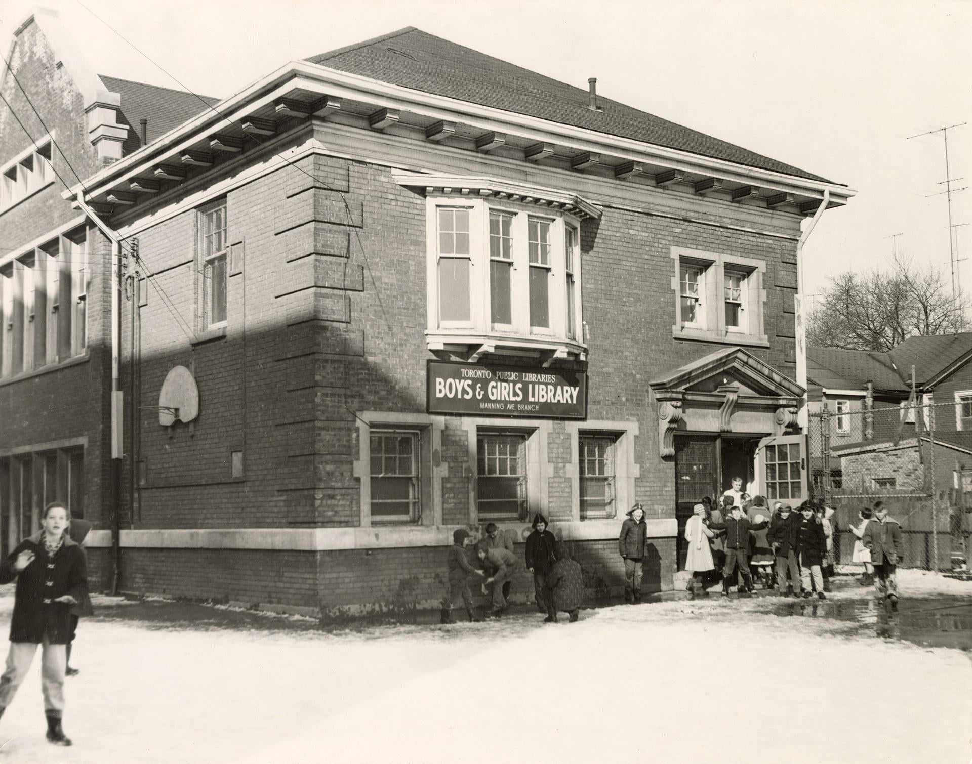 Manning Boys and Girls Branch, Toronto Public Library, located on the grounds of Charles G. Fraser School, Manning Avenue, northeast corner of Robinson Street, 1960